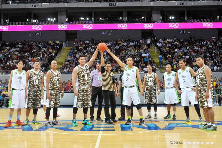Daniel Razon, UNTV Cup's progenitor, pitches the ball for the first match of the season featuring the AFP Cavaliers and the NHA Builders.