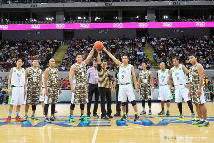 Daniel Razon, UNTV Cup's progenitor, pitches the ball for the first match of the season featuring the AFP Cavaliers and the NHA Builders.